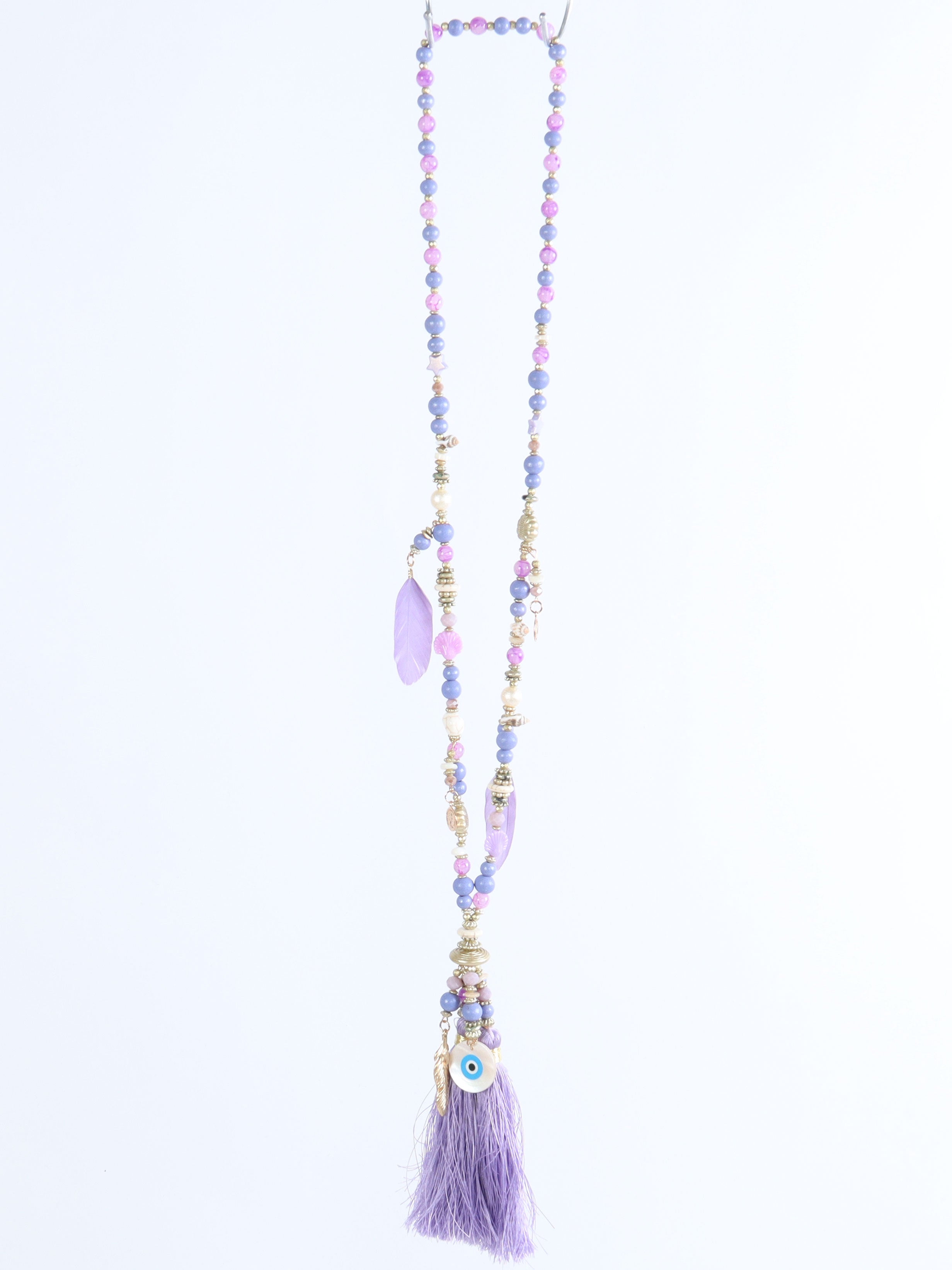 Melda - Beige halsband med fina pärlor och två tofsar